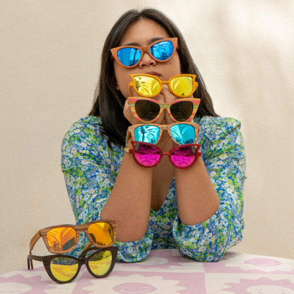 Model showcasing the floating sunglasses line sold in Mayoh