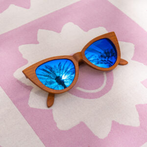 Mayoh's feline UV sunglasses with blue lenses made with cherry bamboo